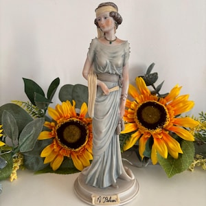 Auro Belcari - Etsy