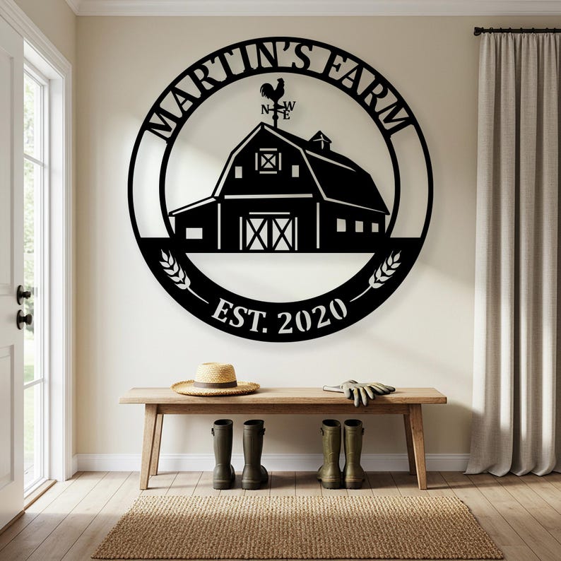 May include: Black metal farmhouse sign with the text "MARTIN'S FARM" in a circular design, featuring a barn illustration and the year "EST. 2020". The sign is mounted on a wall above a wooden bench.