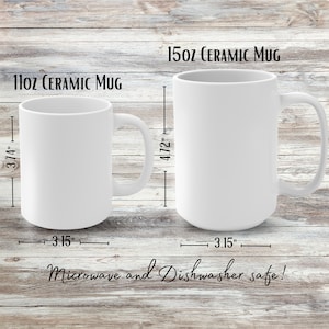 May include: Two white ceramic mugs, one 11 oz and one 15 oz, with measurements in inches. Both mugs are microwave and dishwasher safe.