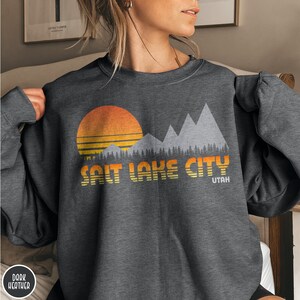 Salt Lake City Sweatshirt Utah Traveler Gift Salt Lake Gift Vintage Mountain Hiking Gift Utah Crewneck SLC Gift Ski Sweatshirt Mountain Sweater Vintage Outdoor Adventure Shirt Utah Gift Camping Gift Retro Sunset Shirt Vacation Shirt Mountaineers Gift