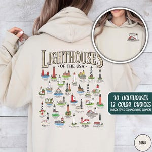 May include: Sand-colored hoodie featuring a detailed graphic of 30 US lighthouses. The back displays a colorful illustration with the text "Lighthouses of the USA." The front has a smaller lighthouse graphic. The hoodie is available in 12 colors.