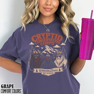 National Parks Cryptid Conservation Shirt Bigfoot Mothman Yeti Wilderness Creature Vintage Tee Protect Our Parks Hiking Camping T-shirt Gift Grape