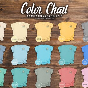 May include: Colour chart for Comfort Colors 1717 unisex heavyweight tee shirts. The chart shows 15 different colours, including Island Reef, Bay, and Blossom.