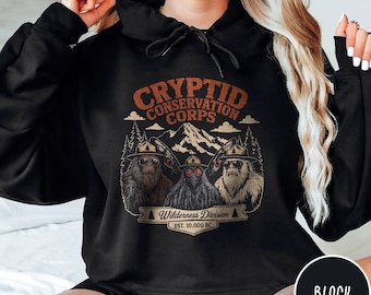 Cryptid Conservation Corps Hoodie National Park Sasquatch Bigfoot Wilderness Adventure Gifts Outdoor Explorer Nature Lovers Vintage Pullover