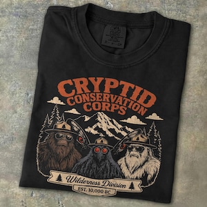 National Parks Cryptid Conservation Shirt Bigfoot Mothman Yeti Wilderness Creature Vintage Tee Protect Our Parks Hiking Camping T-shirt Gift Black
