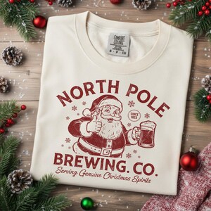 Funny North Pole Brewing Co Santa Tee Funny Winter Comfort Colors Retro Santa Shirt Christmas Spirits Gifted Xmas Xmas Beer Tee Holiday Brew