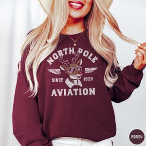 North Pole Aviation Sweatshirt, Reindeer Aviation sweatshirt, Winter Cozy sweater, Snow outfit, holiday gift, Christmas apparel, Winter Wear
