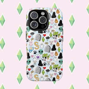 May include: A phone case with a repeating pattern of cartoon graphics. The design includes ghosts, aliens, tombstones, hearts, and other whimsical elements on a light blue background. The case has a black camera module.