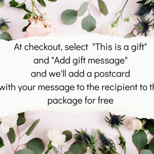 May include: A white card with text on a pink background surrounded by white and green flowers. The text reads: "At checkout, select "This is a gift" and "Add gift message" and we'll add a postcard with your message to the recipient to the package for free."