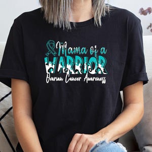 Mama of a Warrior Ovarian Cancer Shirt, Ovarian Cancer Awareness, Ovarian Cancer Survivor Tee, Ovarian Cancer Gift, Teal Cancer Ribbon Shirt