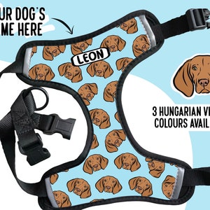 May include: A blue dog harness with a pattern of brown Vizsla dogs. The harness has a black adjustable strap and buckle. The text "LEON" is printed on the harness. The text "3 HUNGARIAN VIZSLA COLOURS AVAILABLE" is printed below the image of a brown Vizsla dog.