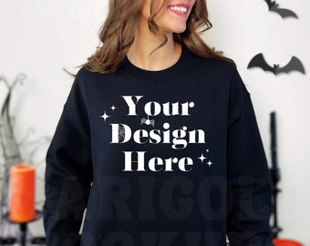 May include: Black sweatshirt with a white design that says "Your Design Here" with a spider and stars.