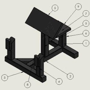 May include: Black metal stand with a rectangular top, designed to hold a guitar. The stand has a triangular base for stability and features multiple support bars.