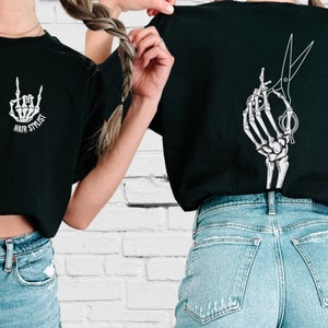 Spooky Chic: Halloween Hair Stylist Shirt with Skeleton Hand and Scissors