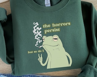 The Horrors Persist Frog Sweatshirt Funny Crewnecks Froggy Funny Cottage Core Frog Lover Silly Gift Liberal Democrat Trendy Gag Gift