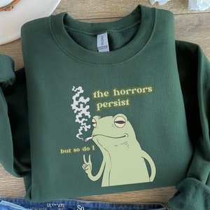 The Horrors Persist Frog Sweatshirt, Funny Crewnecks, Froggy, Funny Cottage Core, Frog Lover, Silly Gift, Liberal Democrat, Gag Gift, Trendy