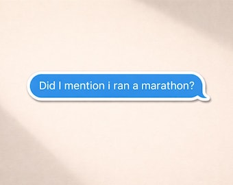 May include: A blue speech bubble sticker with a white border containing the white text "Did I mention i ran a marathon?" in a sans-serif font. The sticker has a rounded rectangular shape with a small tail on the right side.