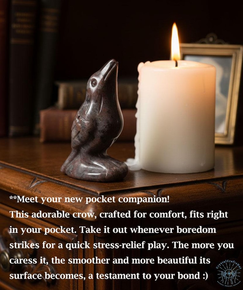 May include: A carved stone crow figurine with a candle and a framed picture. The crow is dark with lighter marbling. A white candle with a lit flame is next to the crow. Text on the image says, "Meet your new pocket companion!"