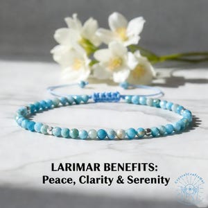 May include: A delicate blue Larimar beaded bracelet with a sliding knot closure. The bracelet is displayed with white flowers in the background. Text on the image reads "LARIMAR BENEFITS: Peace, Clarity & Serenity."