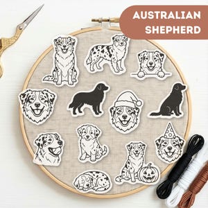 Könnte beinhalten: Eine Sammlung von Australian Shepherd-Aufklebern in verschiedenen Posen, darunter Hunde mit Weihnachtsmütze, Partyhut und Kürbis. Die Aufkleber sind auf einem runden Stickrahmen angeordnet, mit dem Text AUSTRALIAN SHEPHERD.