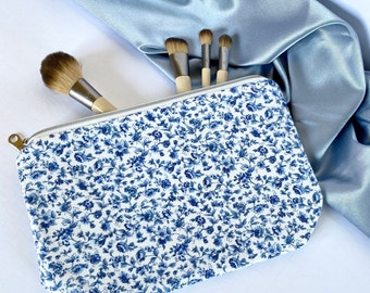 Flat blue floral makeup pouch, blue satin lined, luxurious cosmetic pouch, matching travel set