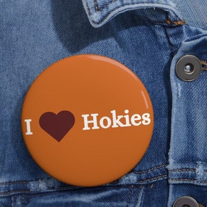 May include: Orange button with the text "I love Hokies" in white with a maroon heart.