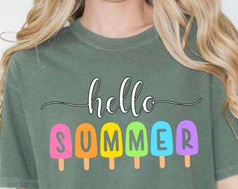 May include: A green t-shirt with the text "hello summer" in a cursive font. The text is surrounded by colorful popsicle-shaped letters.