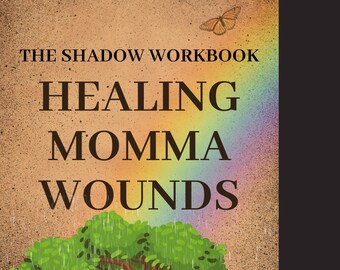 May include: A book cover with the title "The Shadow Workbook: Healing Momma Wounds". The cover features a rainbow, a tree, and a puddle of water. The background is a brown, textured surface.