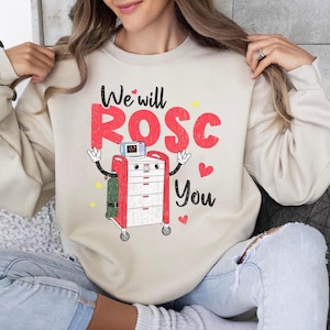 ICU 看護師「We Will Rosc You」おもしろクラッシュカート対応チーム Nu T シャツ、「We Will Rosc You」スウェットシャツ、ハロウィン「We Will Rosc You」シャツ