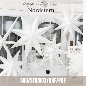 Könnte beinhalten: Eine Sammlung weißer Papierstern-Ornamente in verschiedenen Größen und Designs, einige mit perforierten Mustern. Der Text lautet Digital Cutting Files Nordstern und VIDEO TUTORIAL SVG/STUDIO3/DXF/PDF. Es handelt sich um hängende Dekosterne.