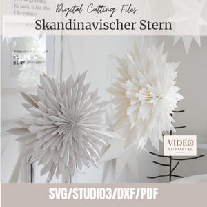 May include: Two large, white, multi-pointed paper stars with intricate, folded geometric designs. The text reads Digital Cutting Files, Skanidnavischer Stern, and VIDEO TUTORIAL. The bottom text lists SVG, STUDIO3, DXF, and PDF file formats.