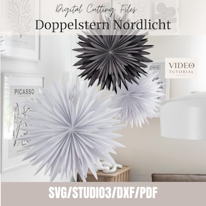 May include: Digital cutting files for Doppelstern Nordlicht paper stars. The image displays three star-shaped paper ornaments in black and white, featuring pointed, folded petals. Text includes Digital Cutting Files, Doppelstern Nordlicht, Video Tutorial, and SVG/STUDIO3/DXF/PDF.