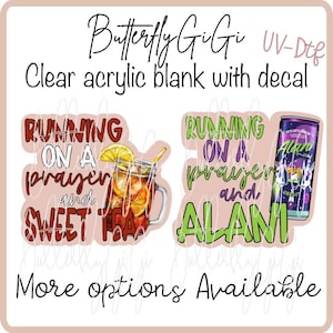 May include: Clear acrylic blanks with decals featuring the text "Running on a prayer and sweet tea" and "Running on a prayer and Alani". The image includes a glass of iced tea and a can of Alani energy drink.