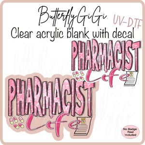 May include: A pink and white decal with the text "Pharmacist Life" in a glittery font. The decal is designed for use on a clear acrylic blank.