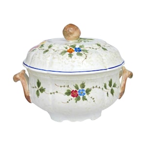 May include: A ceramic tureen with a lid, featuring a cream-colored base with a subtle speckled texture. The piece is decorated with hand-painted floral motifs in red, blue, and orange, accented by green leaves and brown handles with a knob.