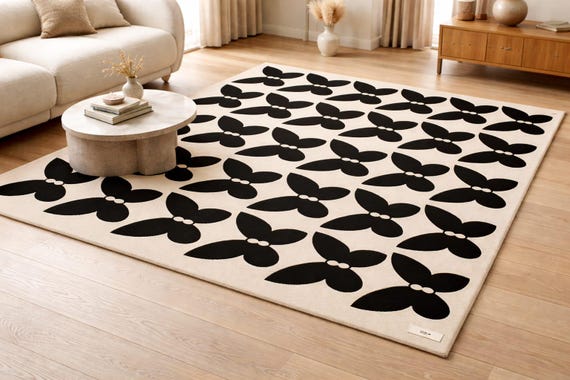 Aesthetic hand tufted wool rug with dark background and light lines resembles natural pattern for home decor, office, kids room and more.