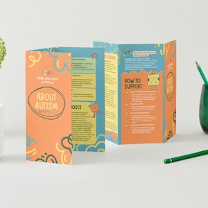 May include: A tri-fold brochure with a cartoon character on the front cover. The brochure is titled "About Autism" and provides information about autism, including what it is, how to support someone with autism, and different types of therapy. The brochure is designed with a bright, colourful, and playful aesthetic.