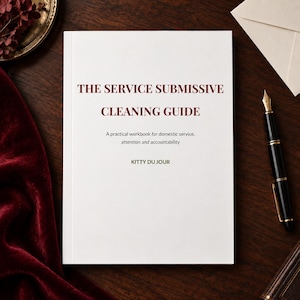 May include: A white book titled THE SERVICE SUBMISSIVE CLEANING GUIDE with the subtitle A practical workbook for domestic service, attention and accountability by KITTY DU JOUR. The book cover features dark red and black text on a white background.