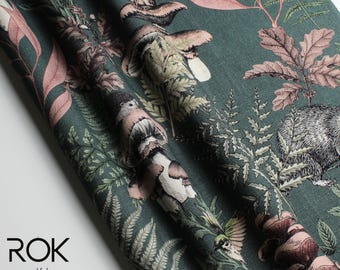 May include: Dark teal fabric with a detailed forest print featuring mushrooms, ferns, and woodland creatures in shades of brown, pink, and green. The fabric has a textured appearance and is suitable for various craft projects.