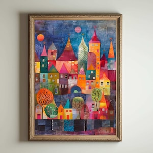 Puede incluir: Una obra de arte enmarcada que representa un colorido paisaje urbano con edificios y árboles caprichosos. La obra presenta una variedad de colores, incluyendo rojo, naranja, amarillo, verde y azul. Los edificios tienen tejados puntiagudos y ventanas, y los árboles tienen formas redondas y abstractas.