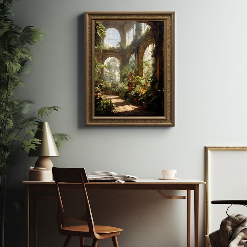 May include: A framed artwork depicts a sunlit conservatory filled with lush greenery and potted plants. The painting features arched windows, a stone pathway, and a warm, inviting color palette. The frame is a warm, ornate gold color.