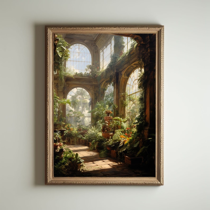 May include: A framed artwork depicts a sunlit conservatory filled with lush greenery. The painting showcases arched windows, brick pathways, and potted plants, creating a serene indoor garden scene. The frame is a light brown color.