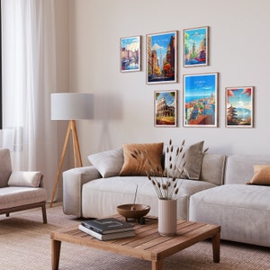 May include: A living room with a white couch, a wooden coffee table, a lamp, and a wall with framed travel posters of cities like New York, Lisbon, Rome, and Tokyo.