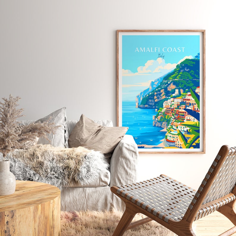 May include: A colorful poster with the text "Amalfi Coast, Italy" depicting a scenic view of the Amalfi Coast with colorful buildings on a cliffside overlooking the blue sea.