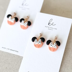 Disney Minnie and Mickey Mouse Inspired Pumpkin Halloween Orange Black Polka Dot Bow Dangle Gold Earrings Handmade of Polymer Clay on Etsy by Katie Collins Design Co.