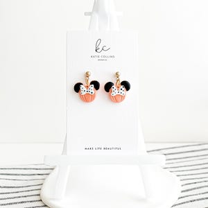 Disney Minnie and Mickey Mouse Inspired Pumpkin Halloween Orange Black Polka Dot Bow Dangle Gold Earrings Handmade of Polymer Clay on Etsy by Katie Collins Design Co.