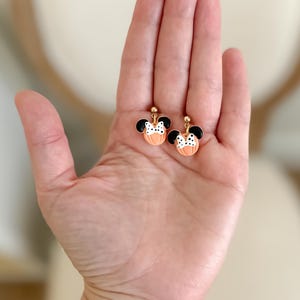 Disney Minnie and Mickey Mouse Inspired Pumpkin Halloween Orange Black Polka Dot Bow Dangle Gold Earrings Handmade of Polymer Clay on Etsy by Katie Collins Design Co.