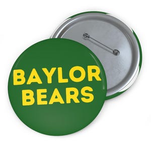 May include: A green button with the words "Baylor Bears" in yellow lettering.
