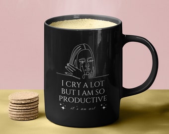 I cry a lot but I am so productive The Tortured Poets Department Black 11 ounce Mug