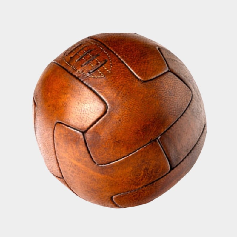 May include: A brown leather soccer ball with a traditional panel design.